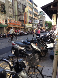Taipei scooters lining city street